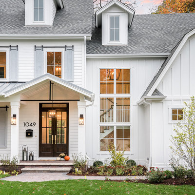 Farmhouse exterior home idea in Chicago
