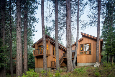 Mountain style wood exterior home photo in Sacramento