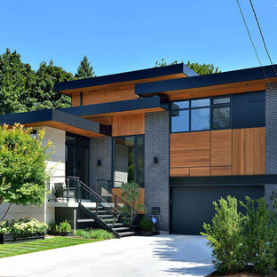 Großes, Zweistöckiges, Graues Modernes Haus mit Mix-Fassade und Flachdach in Toronto