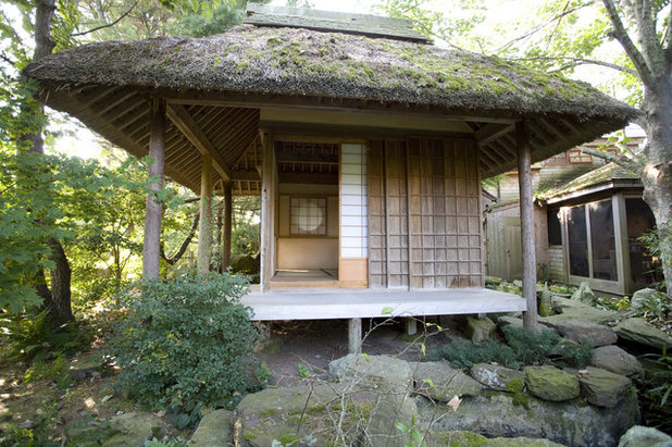 Japanese Exterior by South County Post & Beam, Inc.