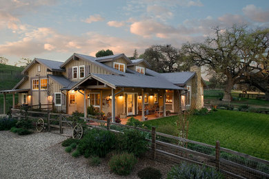 Large farmhouse green two-story mixed siding exterior home photo in Santa Barbara with a metal roof