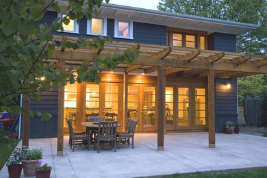 Example of a mid-sized trendy patio design in Seattle