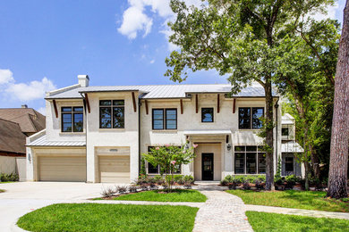 Example of a tuscan exterior home design in Houston