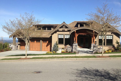 Example of a large mountain style gray three-story mixed siding house exterior design in Seattle with a hip roof and a shingle roof