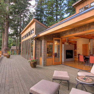 Contemporary two-story wood exterior home idea in Portland