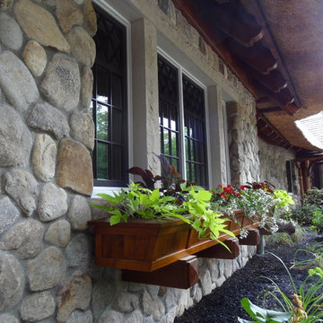 Thatched Roof Home in MA Featuring Boston Blend Round Thin Veneer Siding
