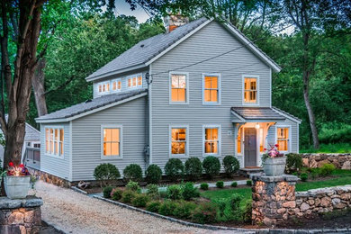 Country gray two-story exterior home idea in New York