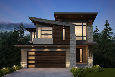 Large contemporary gray two-story stucco house exterior idea in Calgary with a gambrel roof and a shingle roof