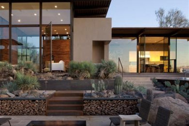 Southwestern exterior home idea in Phoenix