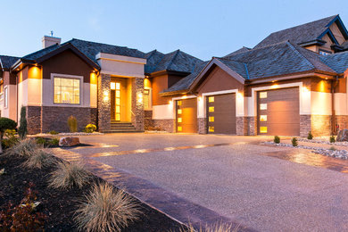 Example of a transitional exterior home design in Edmonton