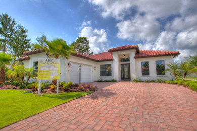 Tuscan one-story exterior home photo in Orlando