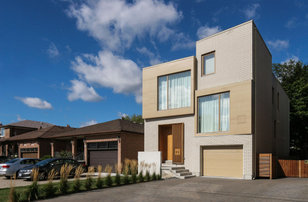 Example of a large danish exterior home design in Toronto