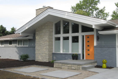 Example of a 1960s exterior home design in Other