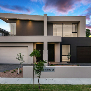 Cette image montre une façade de maison double design.