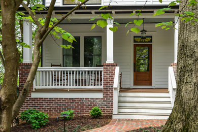 Large transitional white two-story concrete fiberboard exterior home idea in Atlanta with a hip roof