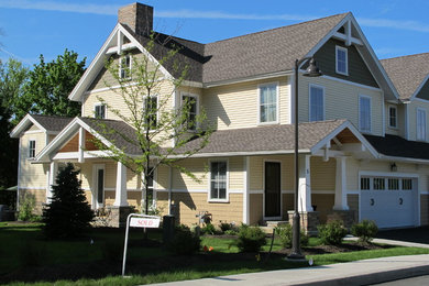 Example of an arts and crafts exterior home design in Boston