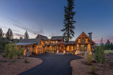 Mid-sized rustic two-story wood gable roof idea in Sacramento