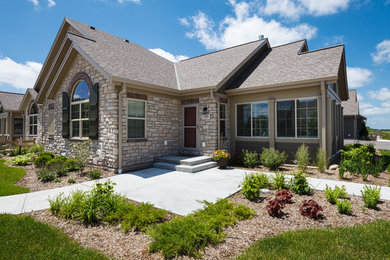 Example of a transitional exterior home design in Milwaukee