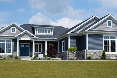 Arts and crafts gray one-story vinyl exterior home photo in Cleveland