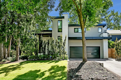 Modern gray two-story exterior home idea in Toronto