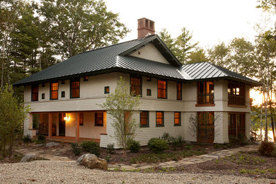 Mountain style white two-story exterior home photo in Portland Maine