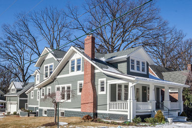 Mid-sized arts and crafts gray split-level mixed siding exterior home photo in DC Metro