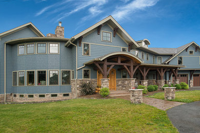 Example of an arts and crafts exterior home design in New York