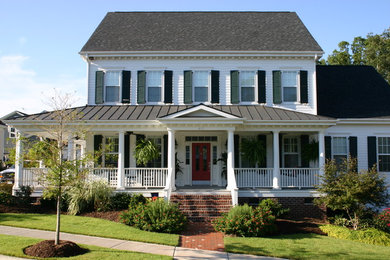 Mid-sized elegant white two-story wood gable roof photo in Charlotte with a mixed material roof
