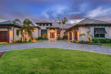 Example of a large transitional white one-story exterior home design in Tampa