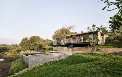 A Riverfront Home in the Ghats is Camouflaged With a Green Roof