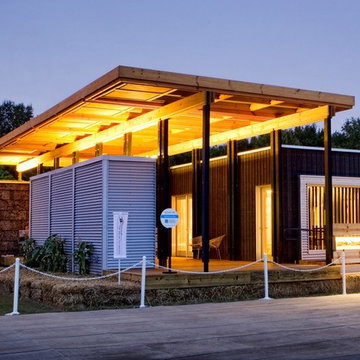 The Solar Homestead - Bark House Shingle Siding