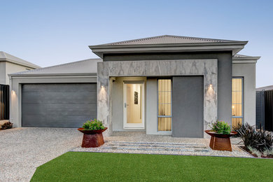 Expansive and gey contemporary bungalow house exterior in Perth.