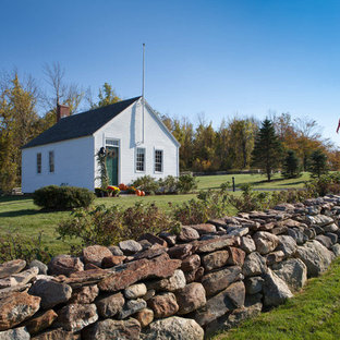 Farmhouse white one-story gable roof photo in Boston