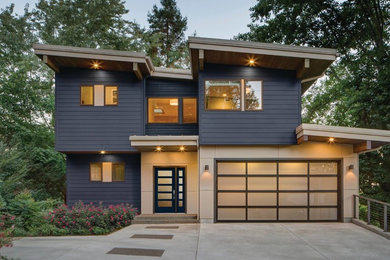 Inspiration for a large contemporary multicolored two-story mixed siding exterior home remodel in Indianapolis