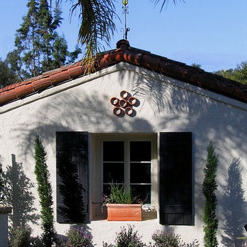 Thick Wooden Shutters on a small Spanish Style home in Montecito