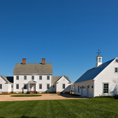 Inspiration for a large cottage white two-story wood exterior home remodel in DC Metro