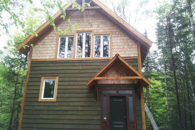 Rustic exterior home idea in Ottawa