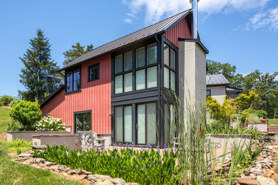 Idées déco pour une façade de maison contemporaine.