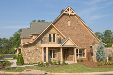 Mid-sized traditional beige two-story mixed siding gable roof idea in Atlanta