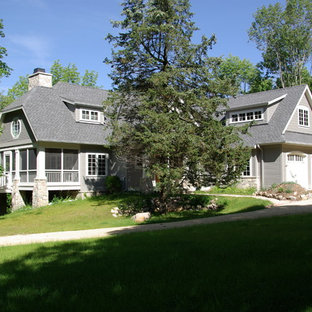 Mid-sized elegant gray two-story wood gable roof photo in Milwaukee