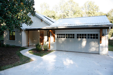 Mid-sized arts and crafts beige one-story concrete gable roof photo in Atlanta