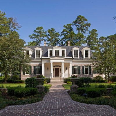 Traditional beige two-story exterior home idea in Charleston