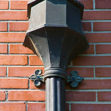 Traditional Kenilworth Renovation with Patina Copper Downspouts