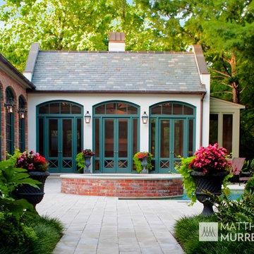 Traditional Southern Stucco Cabana with Copper Screens