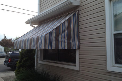 Traditional window awnings (retractable)