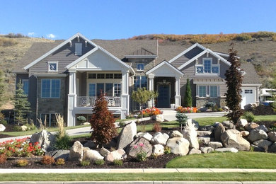 Inspiration for a transitional gray two-story concrete fiberboard gable roof remodel in Salt Lake City