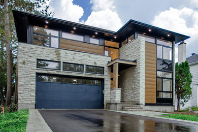Diseño de fachada de casa beige retro grande de dos plantas con revestimiento de piedra