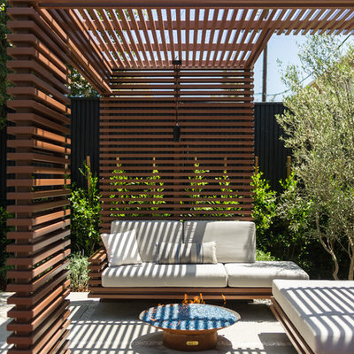 Inspiration for a small contemporary white one-story mixed siding flat roof remodel in Los Angeles