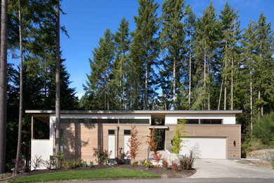 Inspiration for a contemporary two-story mixed siding exterior home remodel in Seattle