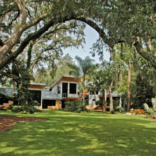 Example of an island style exterior home design in Orlando